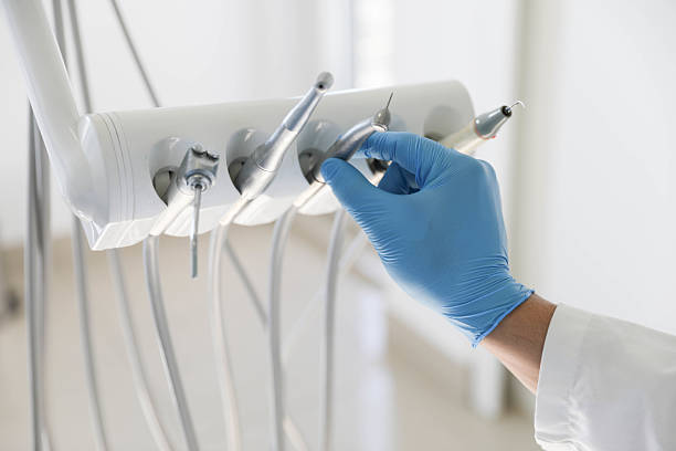 Professional Tooth Extraction technician working in Elwood, IN
